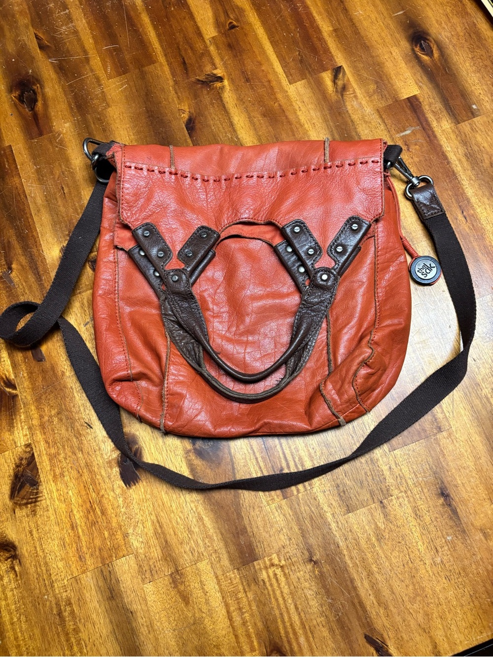 The Sak Rust Orange Leather Crossbody with Dark Brown Trim